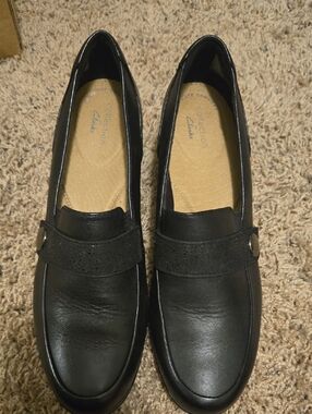Clarks Black Leather Penny Loafers with Button Accent